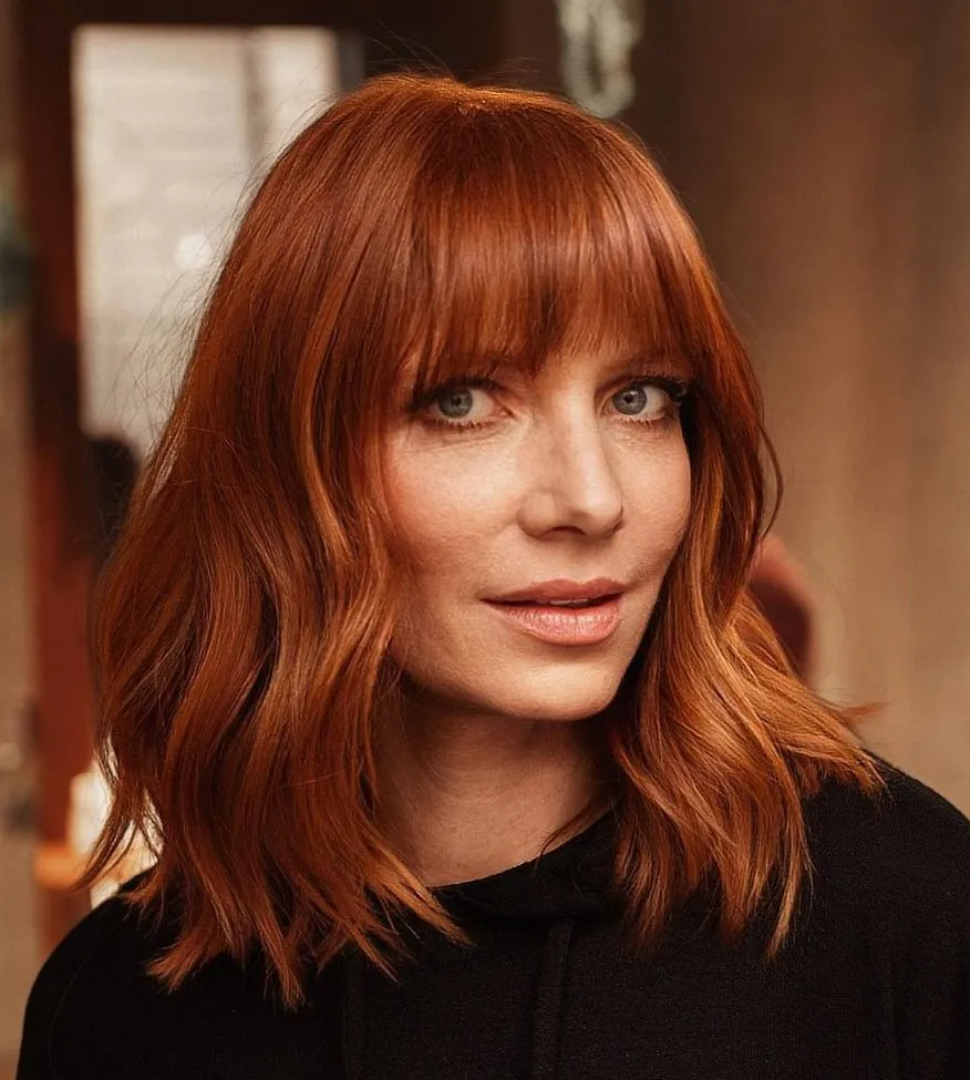 15-bright-copper-hairstyle-with-classy-bangs