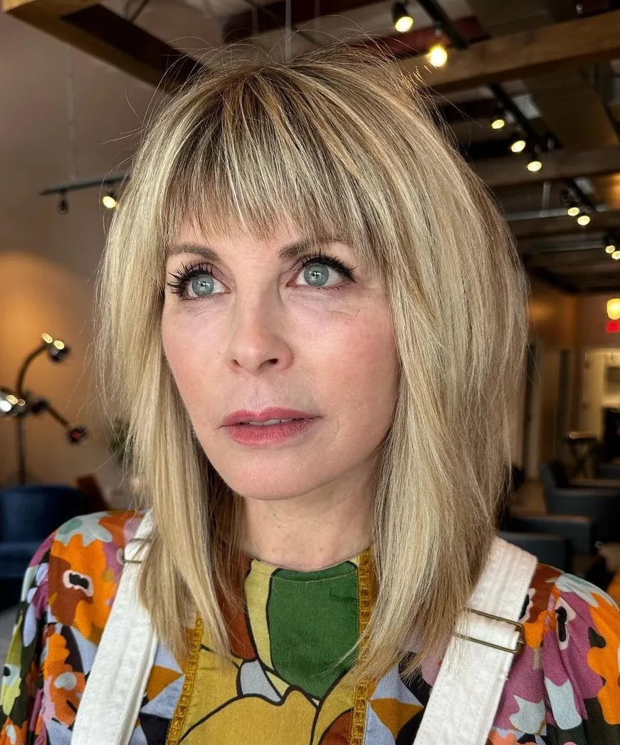 17-medium-haircut-with-bangs-for-women-over-50