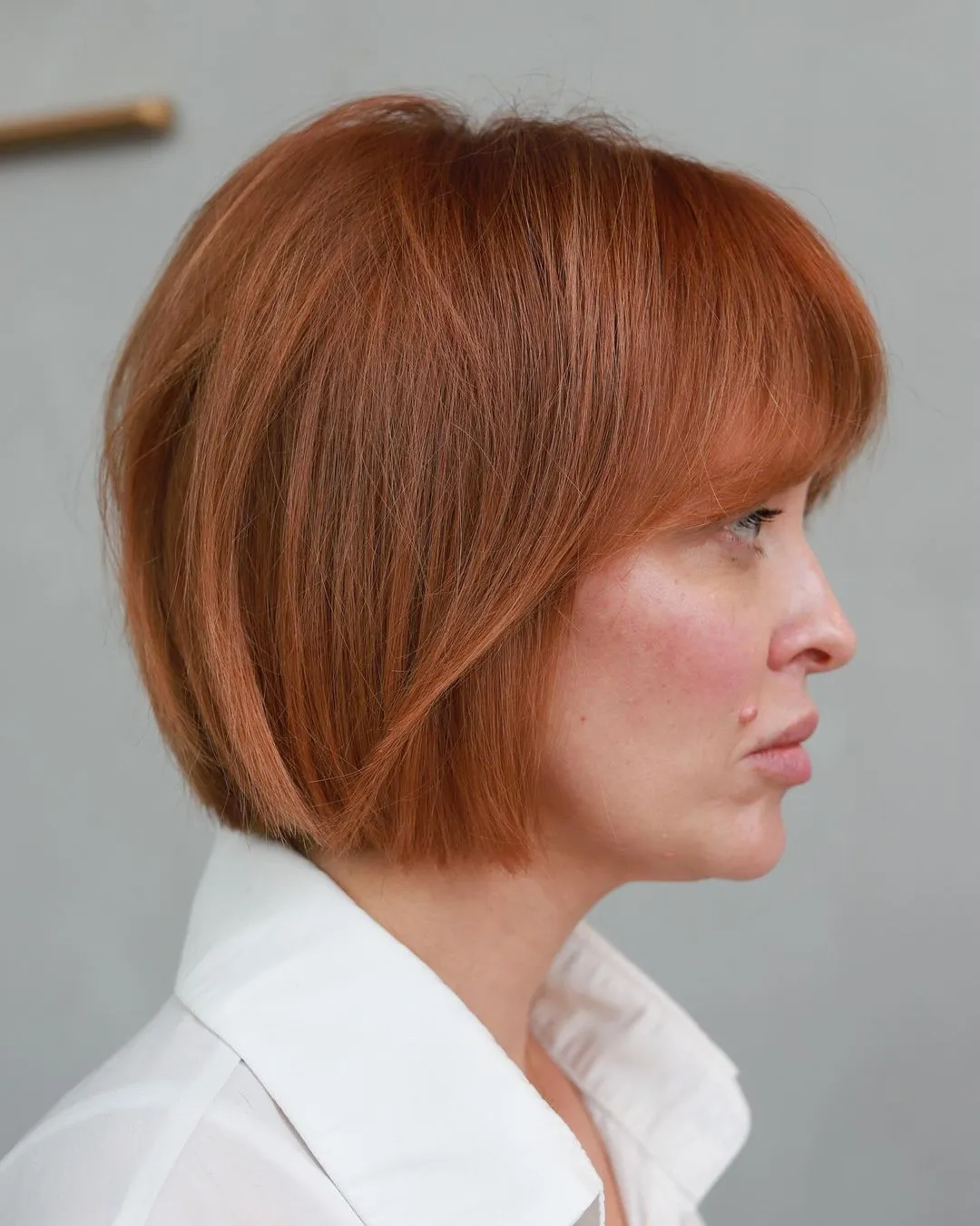 red-retro-bob-with-curtain-bangs