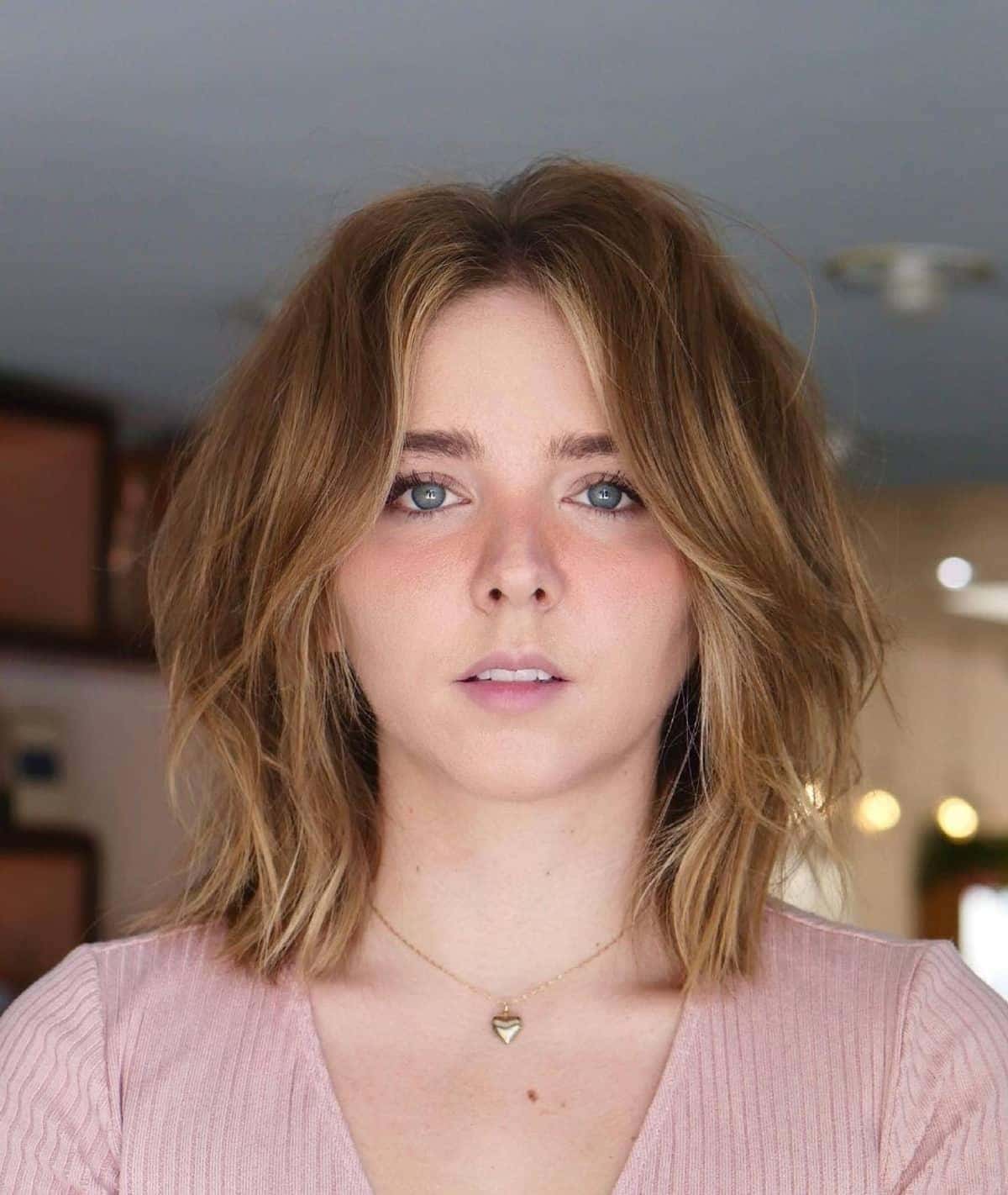Blunt lob with curtain bangs