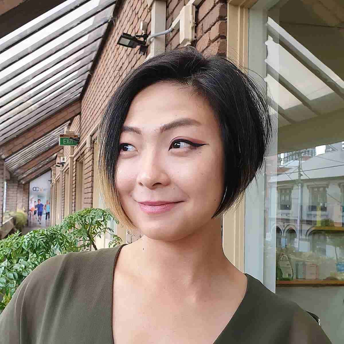 Classic short asymmetrical bob with a deep side part