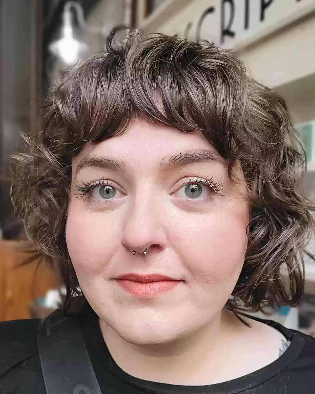 Jaw-Grazing Mini Curly Bob and Bangs for chubbier faces