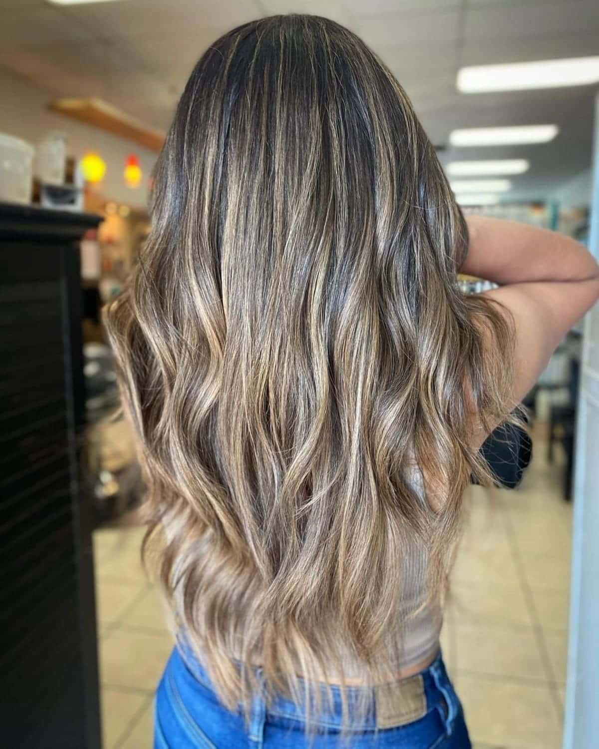 Bright honey blonde highlights on black hair