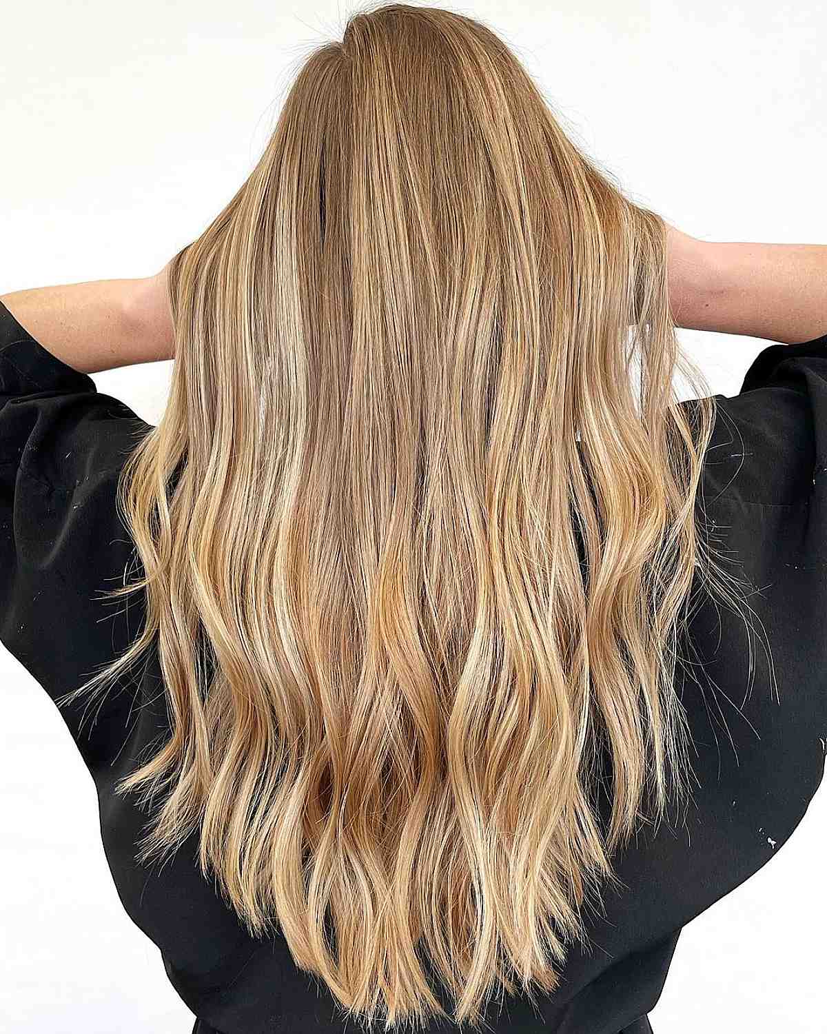 28 Long Blonde Hair Styles That Are Taking Over in 2025 bright and dimensional sandy blonde with long hair