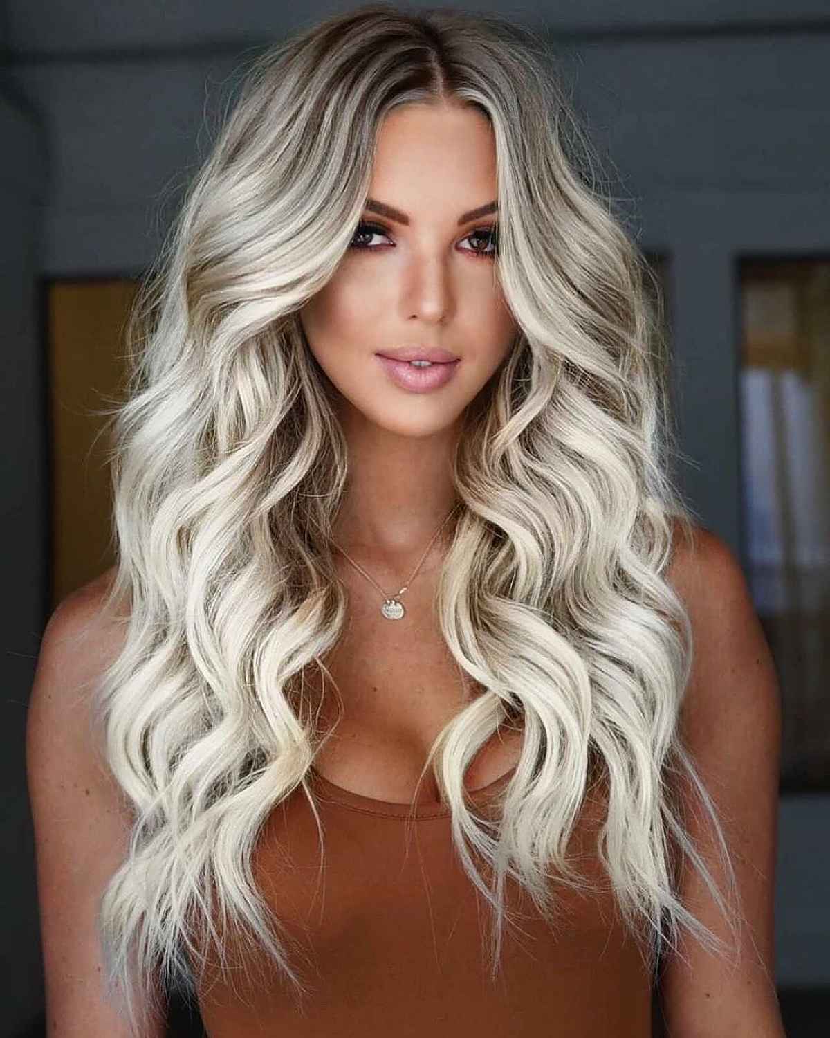 28 Long Blonde Hair Styles That Are Taking Over in 2025 face-framing long blonde layered hairstyle