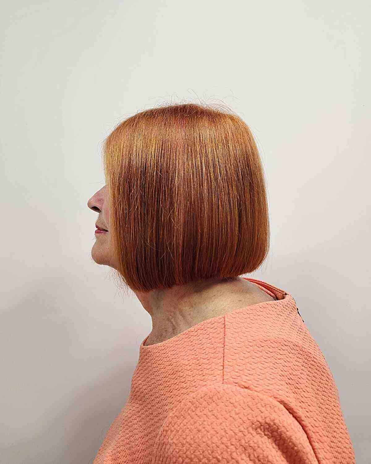 Fall-Inspired Short Haircut with Natural Ginger Color for 60-year-olds