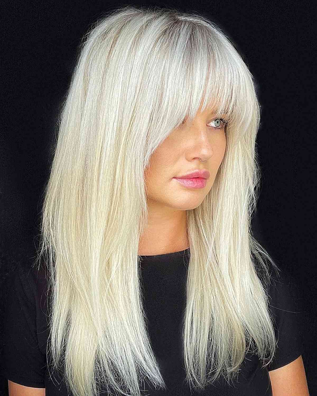 28 Long Blonde Hair Styles That Are Taking Over in 2025 lived-in rooted long blonde hair