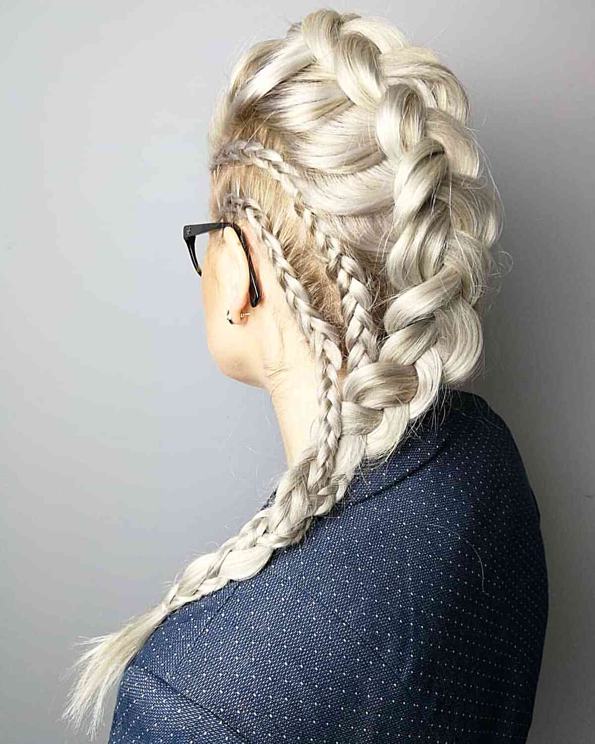 28 Long Blonde Hair Styles That Are Taking Over in 2025 Silvery blonde straight hair in a braid